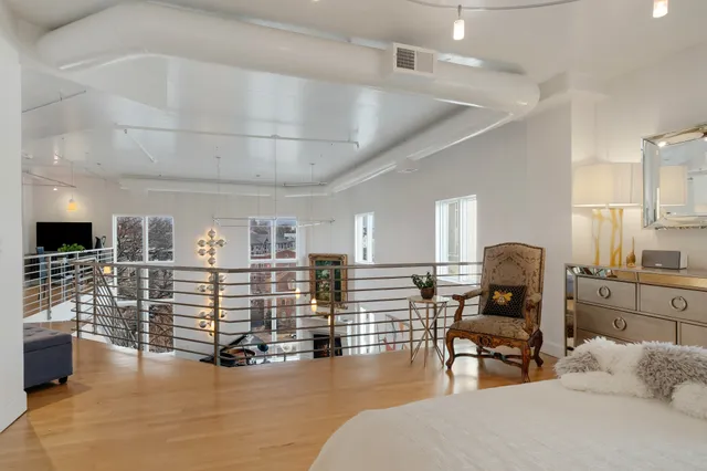 a view of living room with furniture and flat screen tv