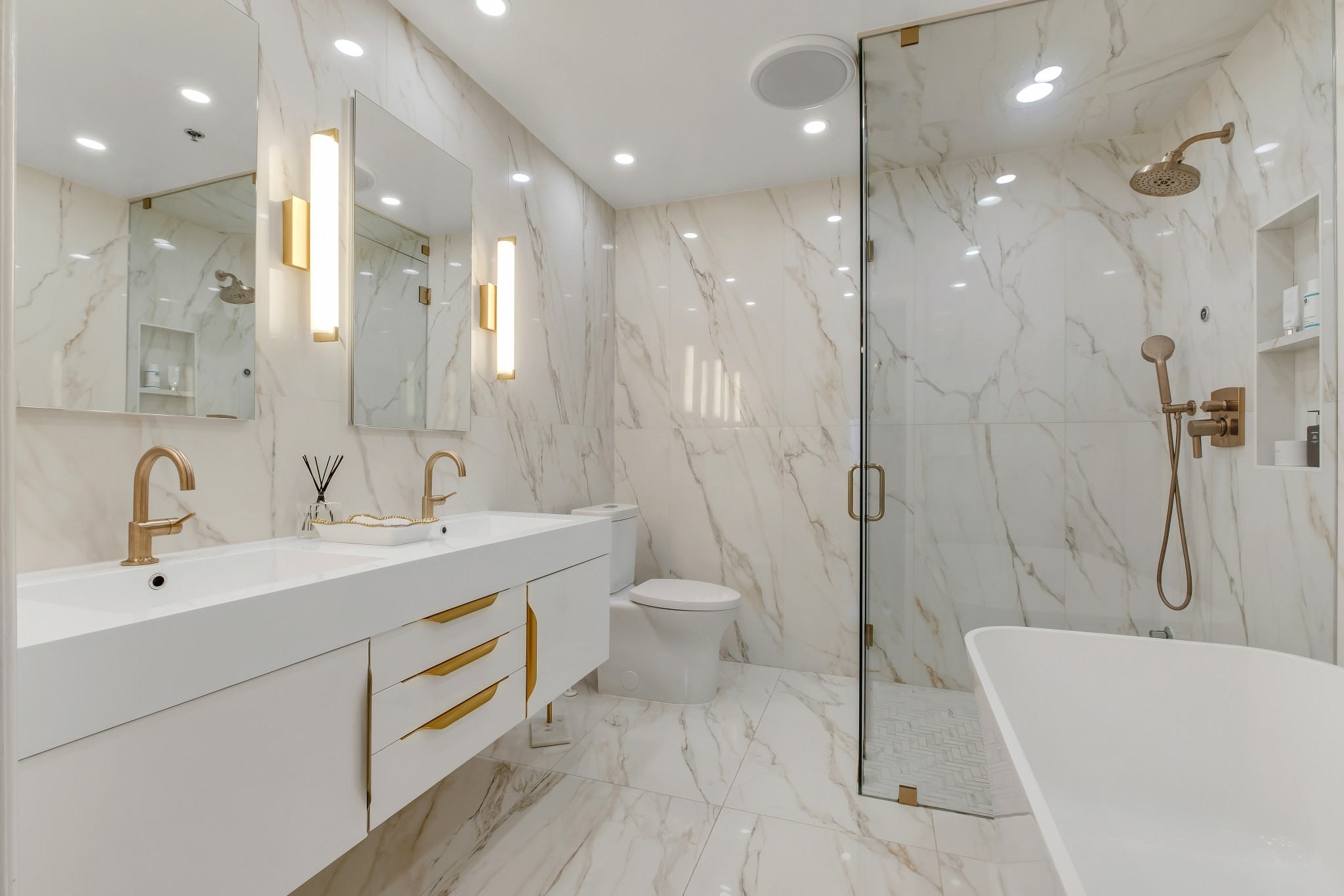 3014 Hedrick Street, Unit 504 Nashville, TN 37203 - Photo 27 of 33 a bathroom with a double vanity sink mirror and shower