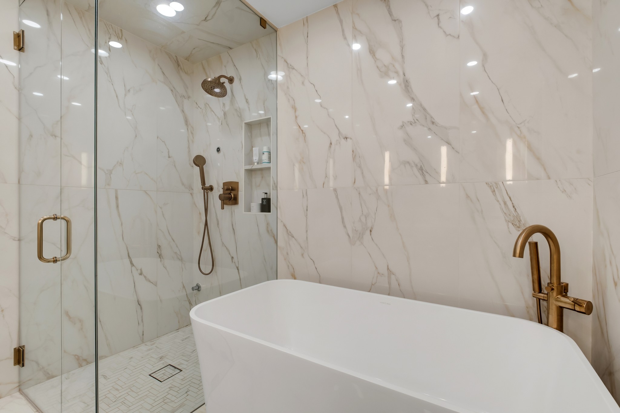 3014 Hedrick Street, Unit 504 Nashville, TN 37203 - Photo 29 of 33 a bathroom with a sink a toilet and a shower