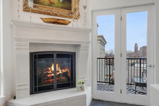 a living room with fireplace