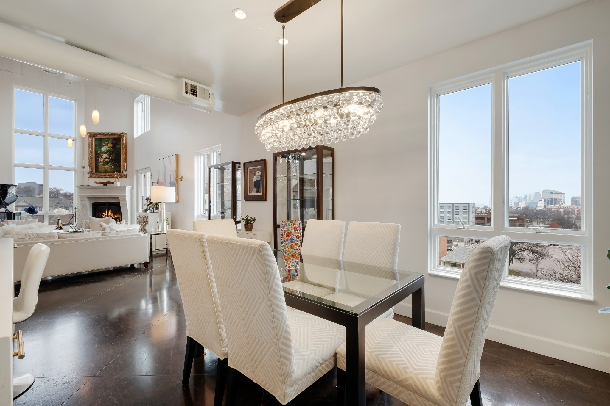 3014 Hedrick Street, Unit 504 Nashville, TN 37203 - Photo 9 of 33 a view of a dining room with furniture wooden floor and chandelier