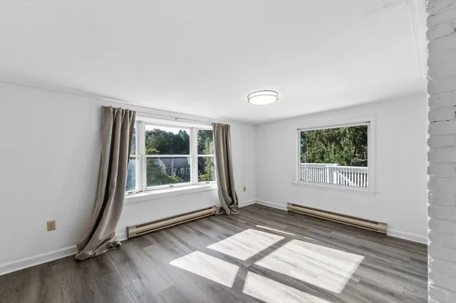 a view of a room with a large window