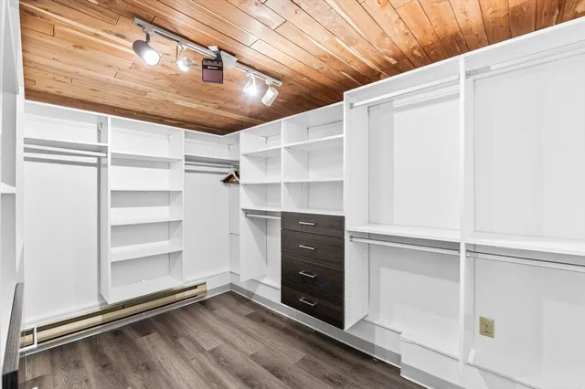 a view of an empty walk in closet