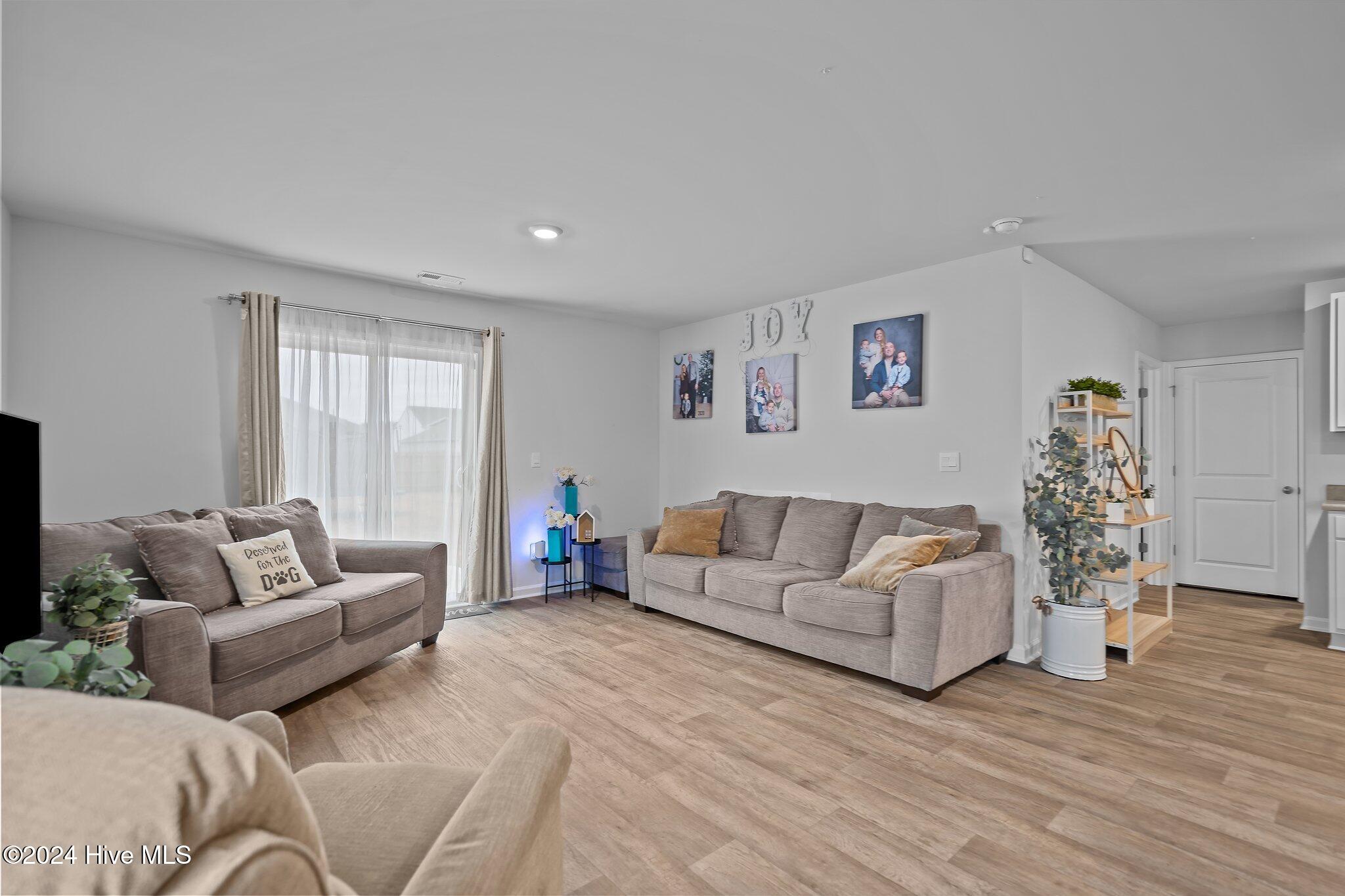 402 Folkstone Road, Unit LOT 71 Holly Ridge, NC 28445 - Photo 14 of 39 Living Room