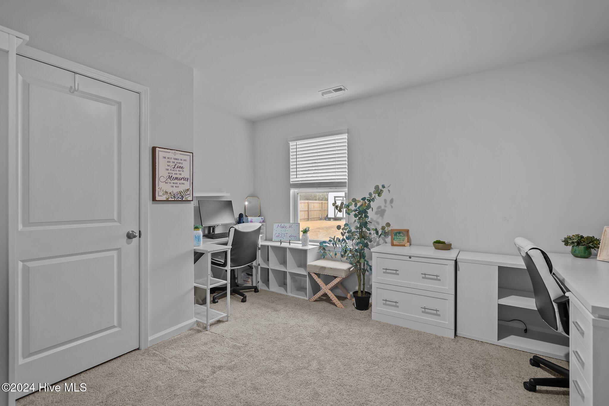 402 Folkstone Road, Unit LOT 71 Holly Ridge, NC 28445 - Photo 15 of 39 1st Floor Bedroom