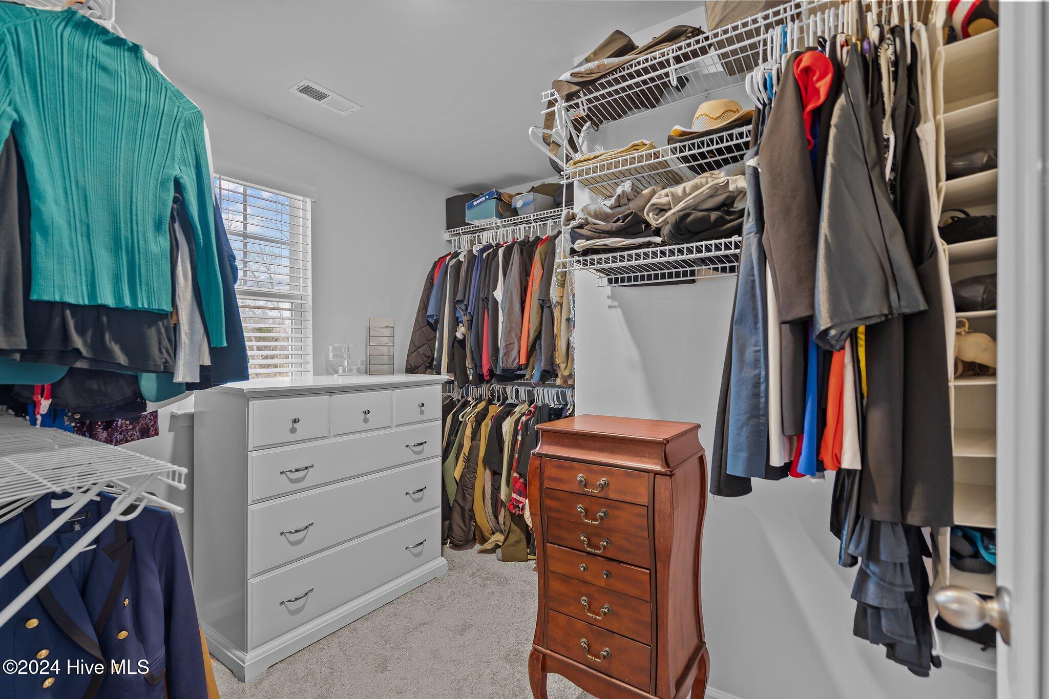 402 Folkstone Road, Unit LOT 71 Holly Ridge, NC 28445 - Photo 27 of 39 Primary Bedroom Closet