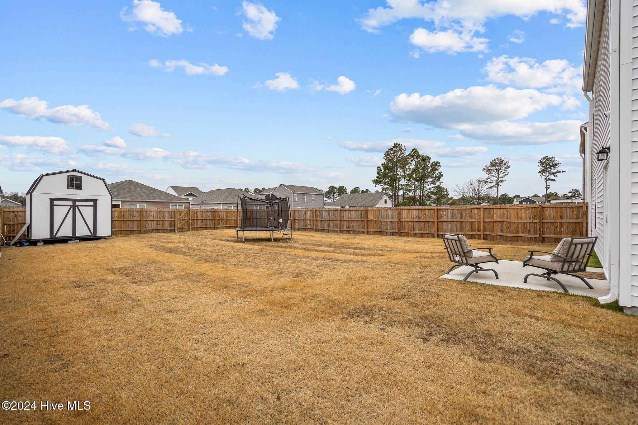 402 Folkstone Road, Unit LOT 71 Holly Ridge, NC 28445 - Photo 34 of 39 Backyard