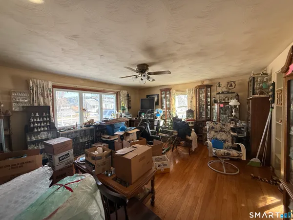 a gym room with lots of gym equipment