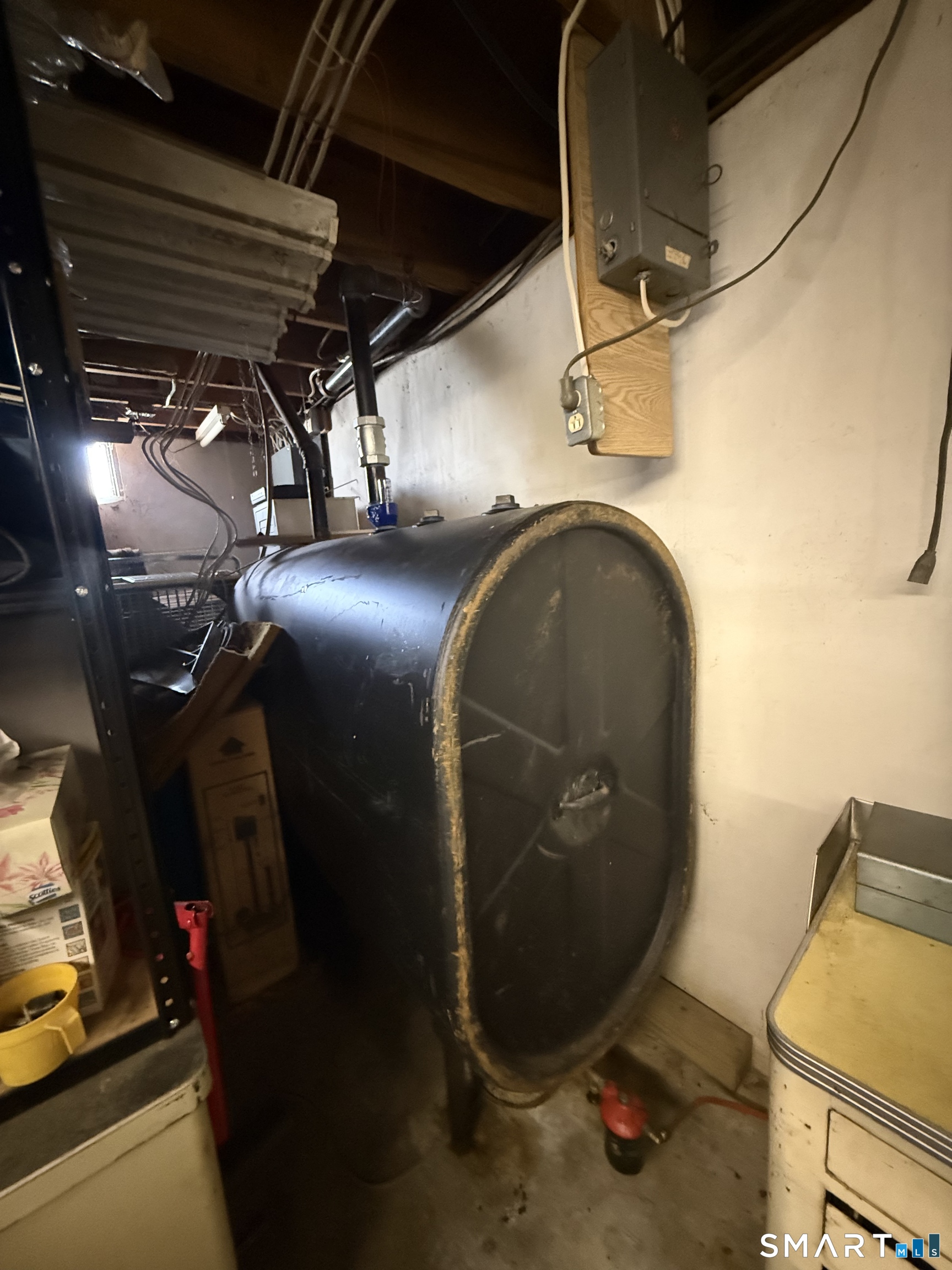 29 Rosedale Street Killingly, CT 06239 - Photo 21 of 23 a close view of water heater room