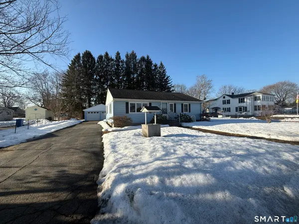 a view of pool with a yard