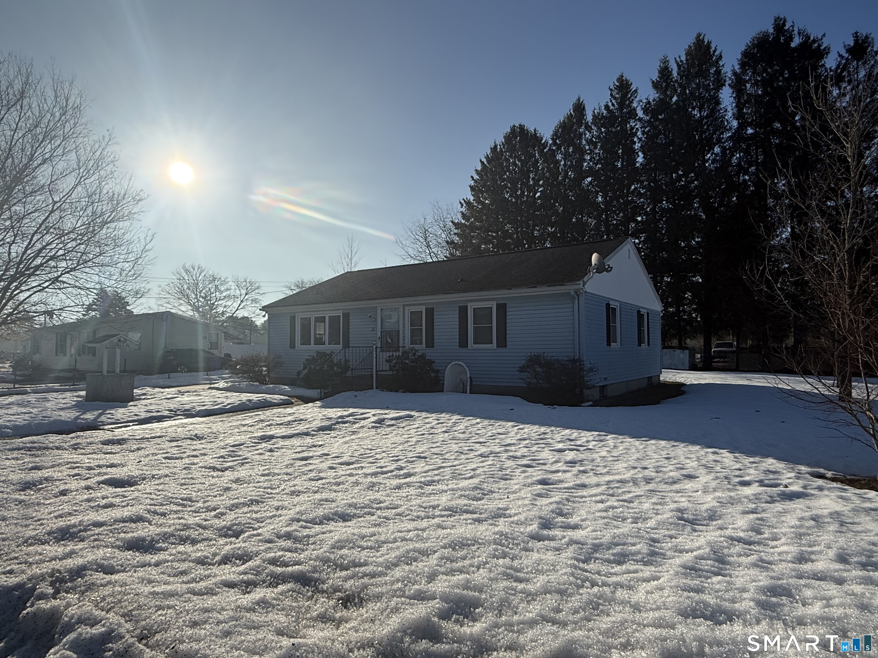 29 Rosedale Street Killingly, CT 06239 - Photo 4 of 23 a front view of a house with a yard