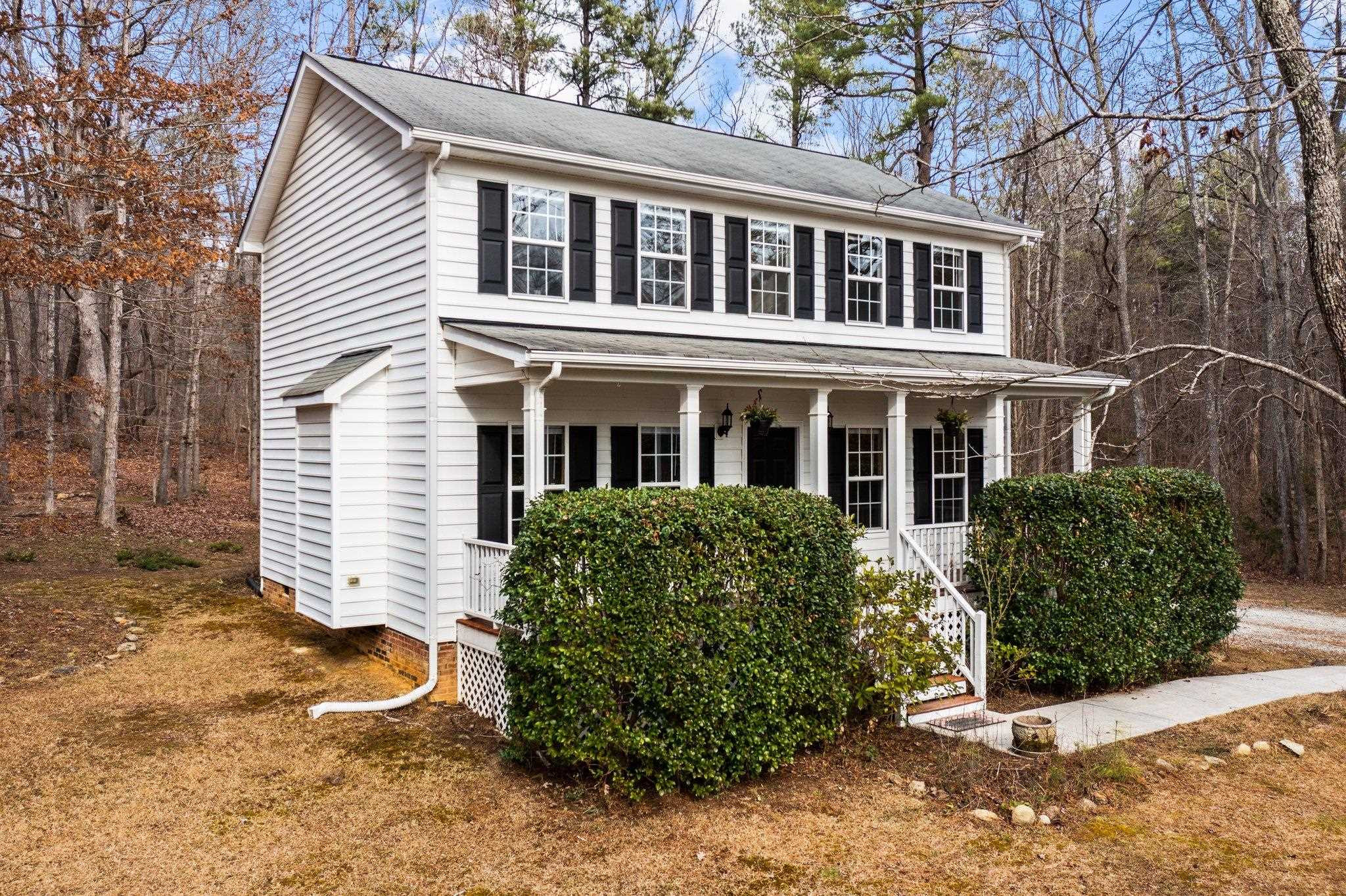 6041 Burgundy Road Durham, NC 27712 - Photo 3 of 45 a view of a house with a yard