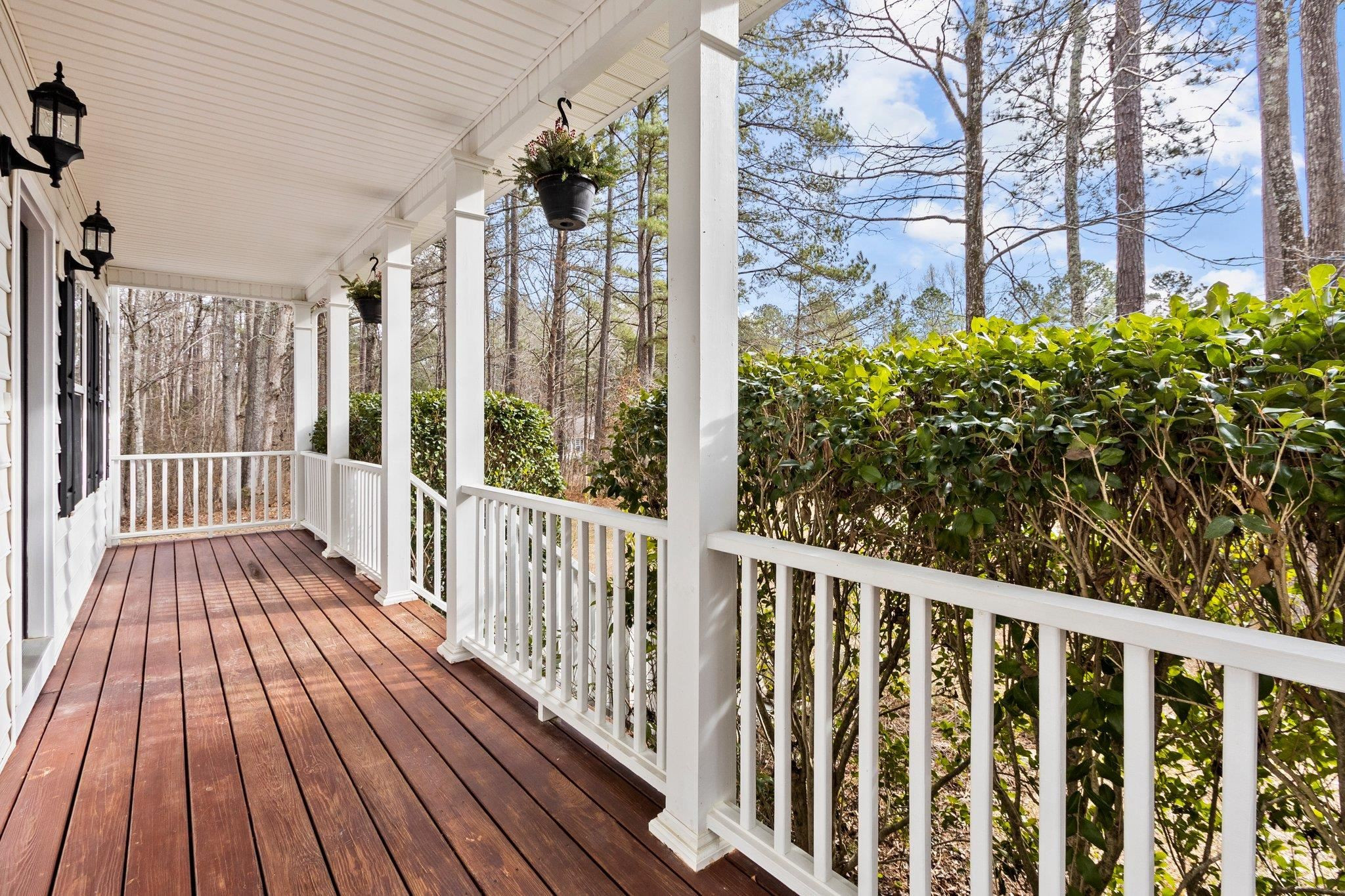 6041 Burgundy Road Durham, NC 27712 - Photo 5 of 45 a view of a wooden deck