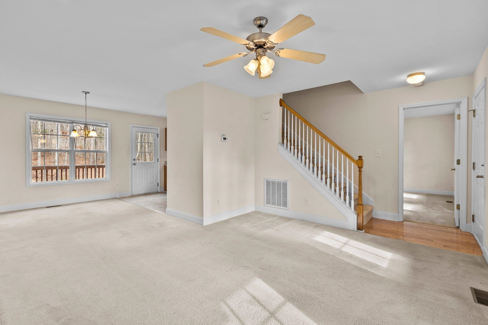 6041 Burgundy Road Durham, NC 27712 - Photo 8 of 45 a view of an empty room with a window