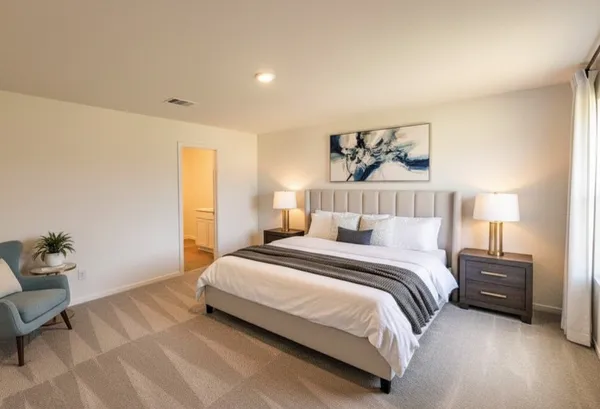 a bedroom with a bed and window