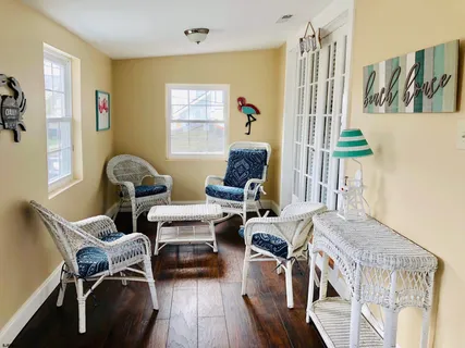 a workspace with furniture and wooden floor