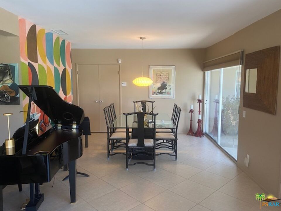 2033 Ramon Road, Unit 4B Palm Springs, CA 92264 - Photo 17 of 44 a view of a dining room with furniture