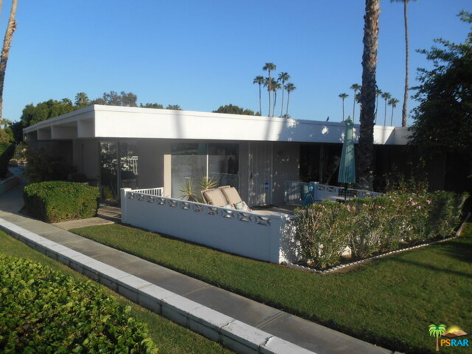 2033 Ramon Road, Unit 4B Palm Springs, CA 92264 - Photo 2 of 44 a view of a house with backyard and sitting area