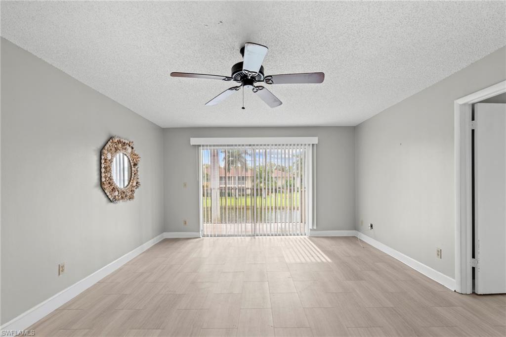 6184 Michelle Way, Unit 243 Fort Myers, FL 33919 - Photo 3 of 21 a view of an empty room with a window