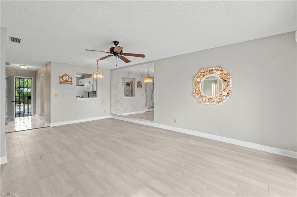 6184 Michelle Way, Unit 243 Fort Myers, FL 33919 - Photo 6 of 21 a view of a livingroom with a window