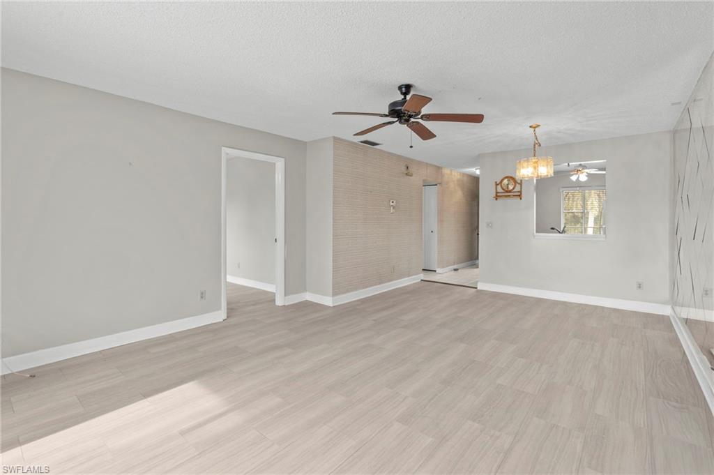 6184 Michelle Way, Unit 243 Fort Myers, FL 33919 - Photo 7 of 21 a view of a chandelier fan and entryway