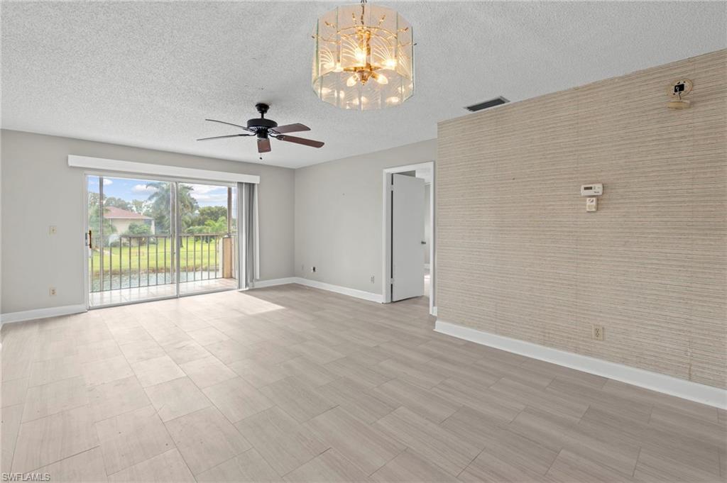 6184 Michelle Way, Unit 243 Fort Myers, FL 33919 - Photo 8 of 21 a view of an empty room with a window