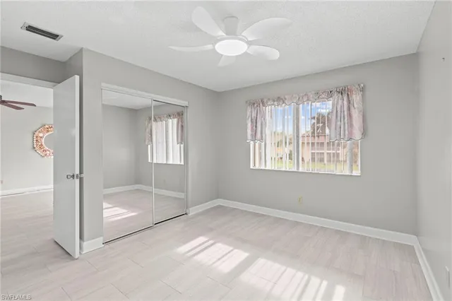 a view of an empty room with window