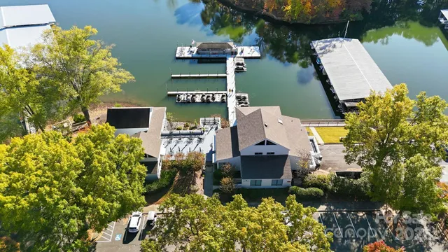 an aerial view of a house with outdoor space