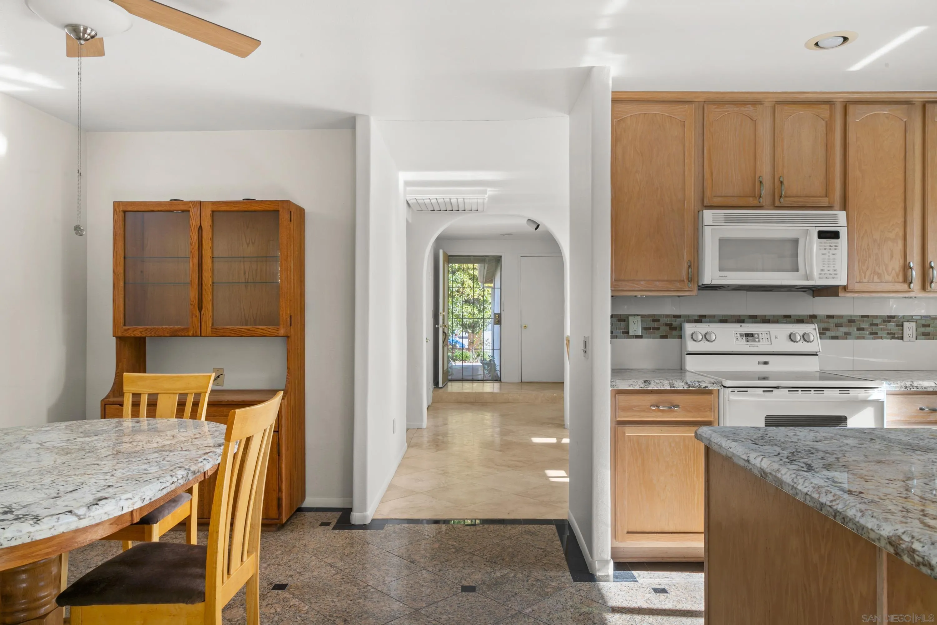 13840 Olive Grove Place Poway, CA 92064 - Photo 12 of 40 a view of a kitchen cabinets and a wooden floor