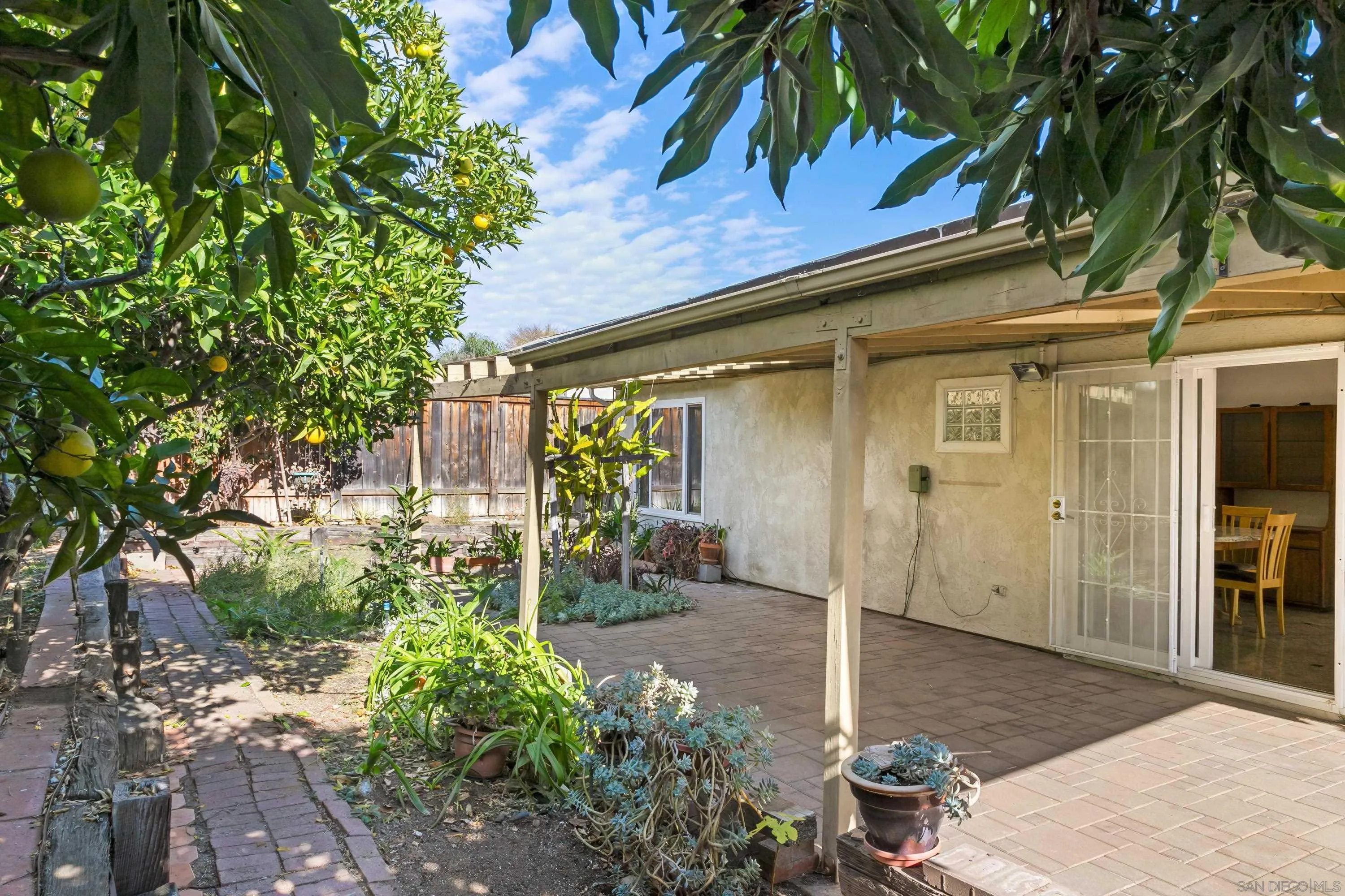 13840 Olive Grove Place Poway, CA 92064 - Photo 33 of 40 a front view of a house with garden