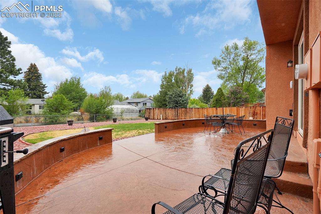 4930 Harvest Road Colorado Springs, CO 80917 - Photo 36 of 39 a view of a lake with sitting area