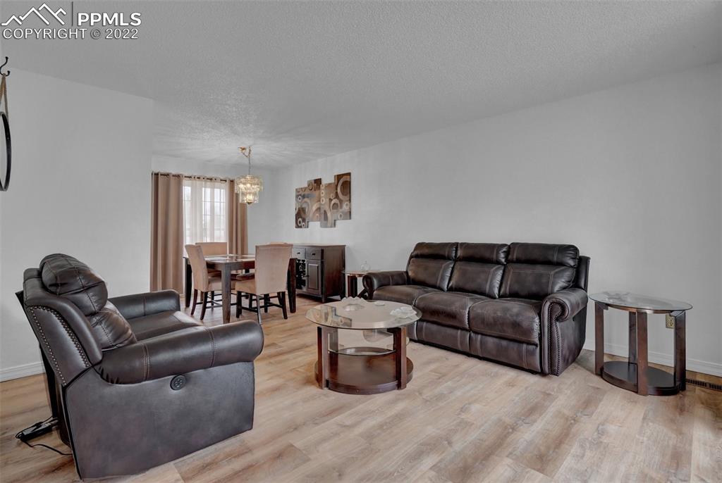 4930 Harvest Road Colorado Springs, CO 80917 - Photo 4 of 39 a living room with furniture