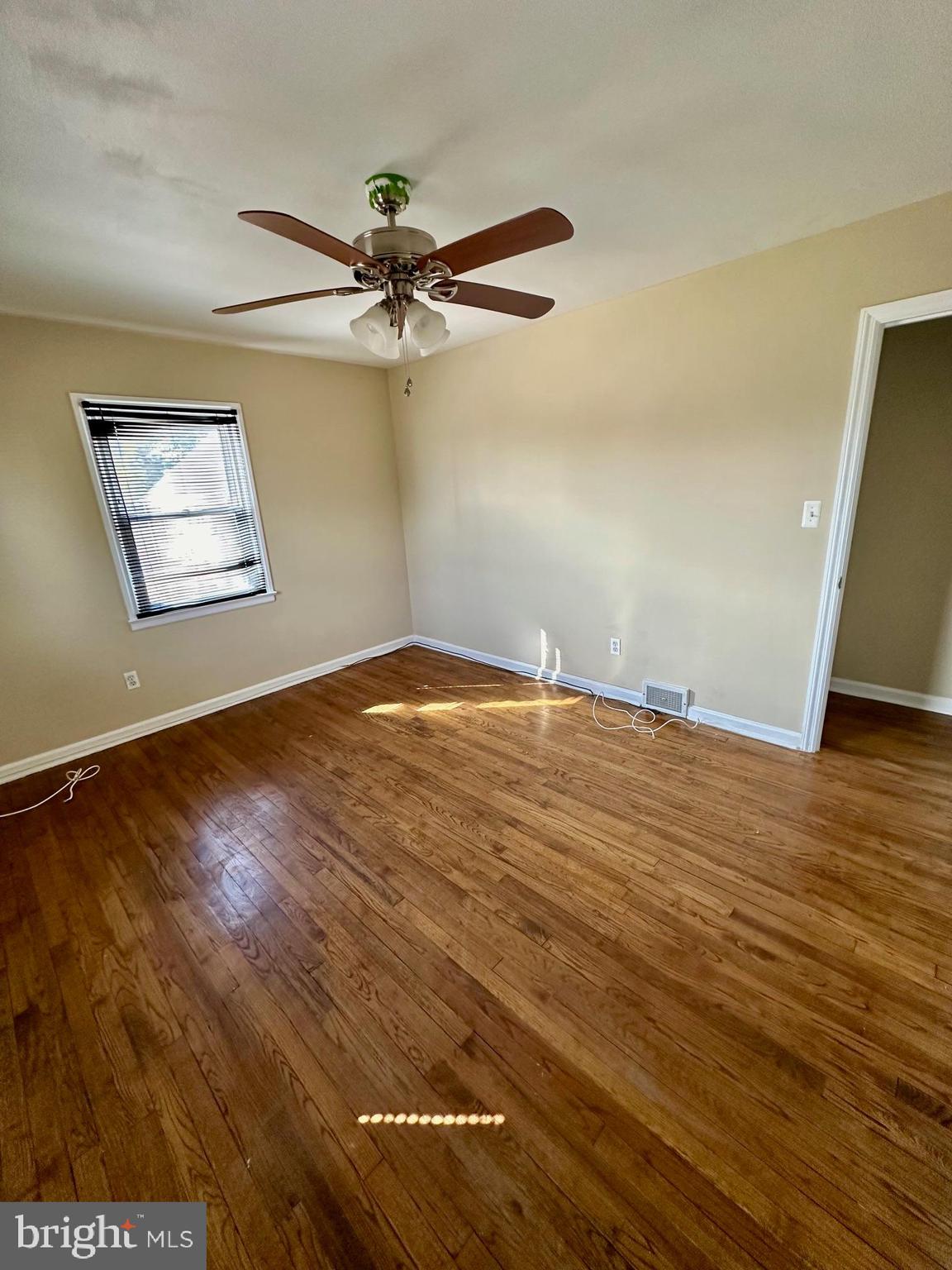 128 Central Avenue Ewing, NJ 08628 - Photo 12 of 15 a view of empty room with wooden floor