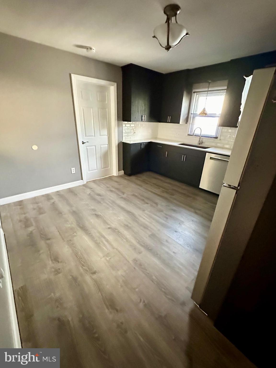 128 Central Avenue Ewing, NJ 08628 - Photo 3 of 15 a view of kitchen with sink and refrigerator