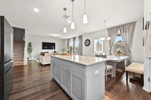 a kitchen with counter top space and sink