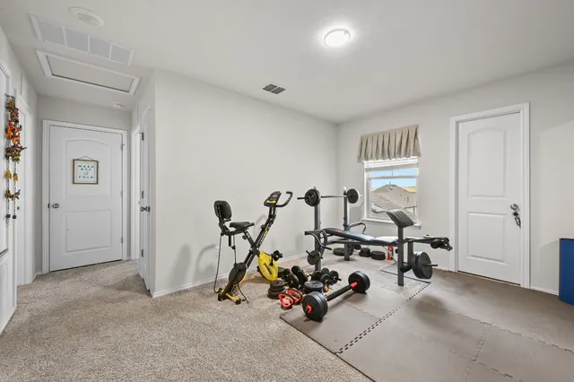 a view of a room with gym equipment