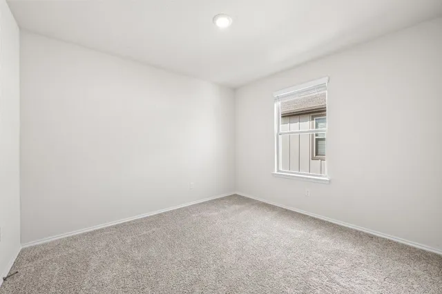 a bathroom with a sink toilet and mirror