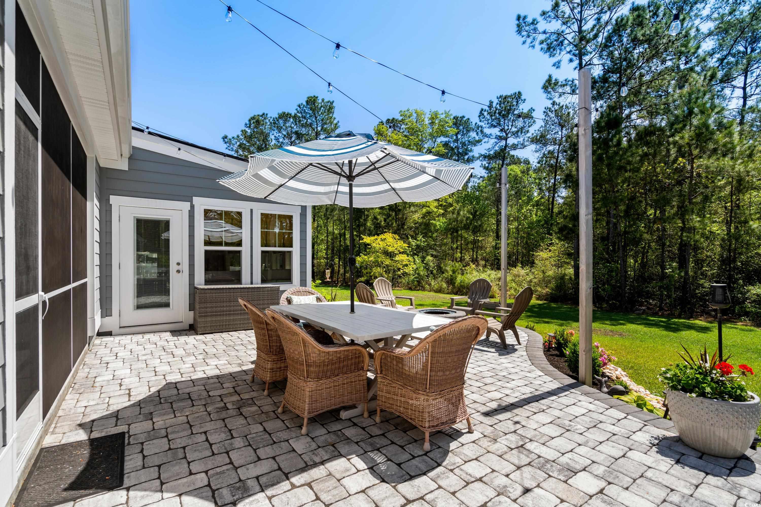 1016 Saluda River Road Murrells Inlet, SC 29576 - Photo 12 of 38 View of patio featuring outdoor dining area