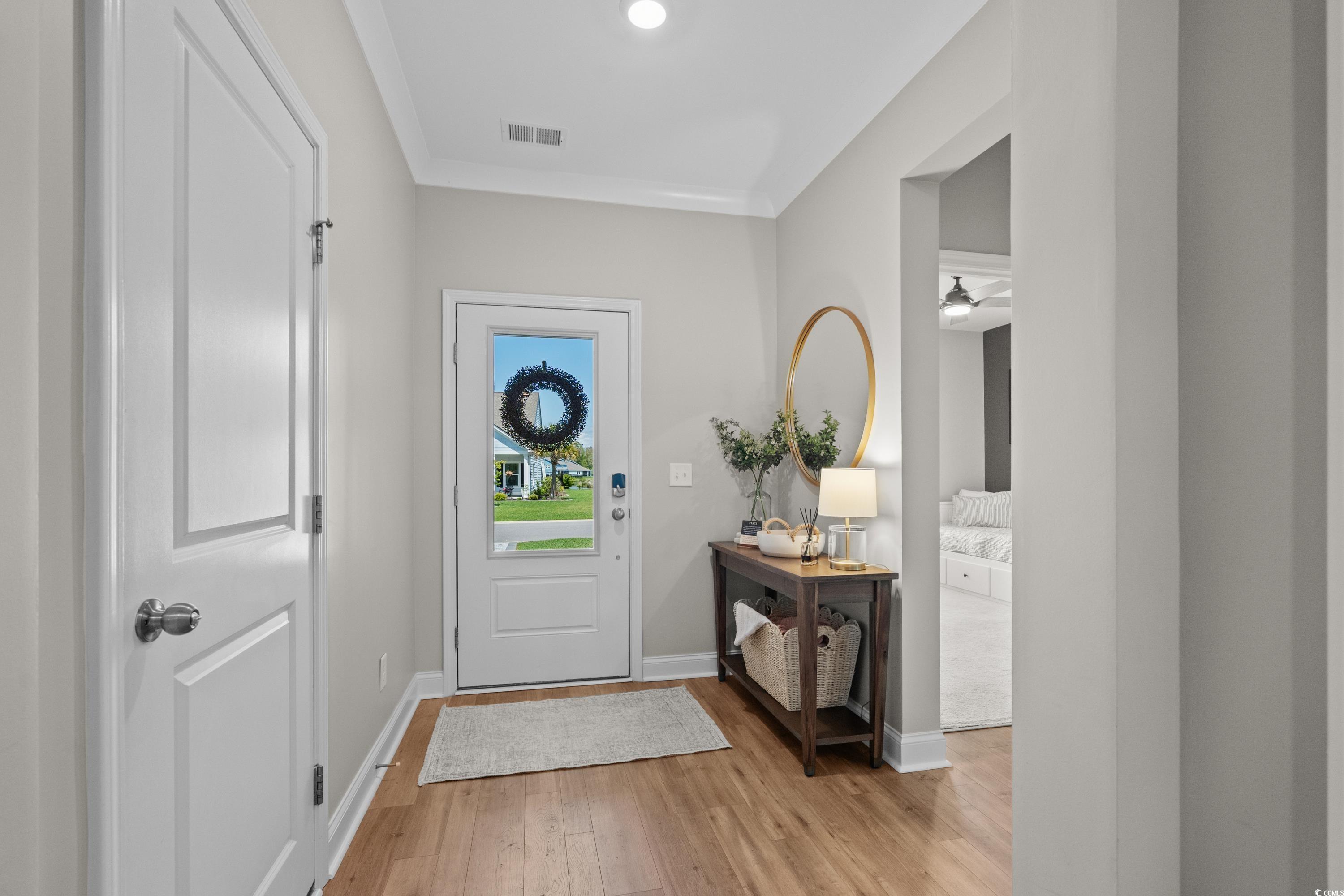 1016 Saluda River Road Murrells Inlet, SC 29576 - Photo 2 of 38 Foyer with visible vents, light wood-type flooring