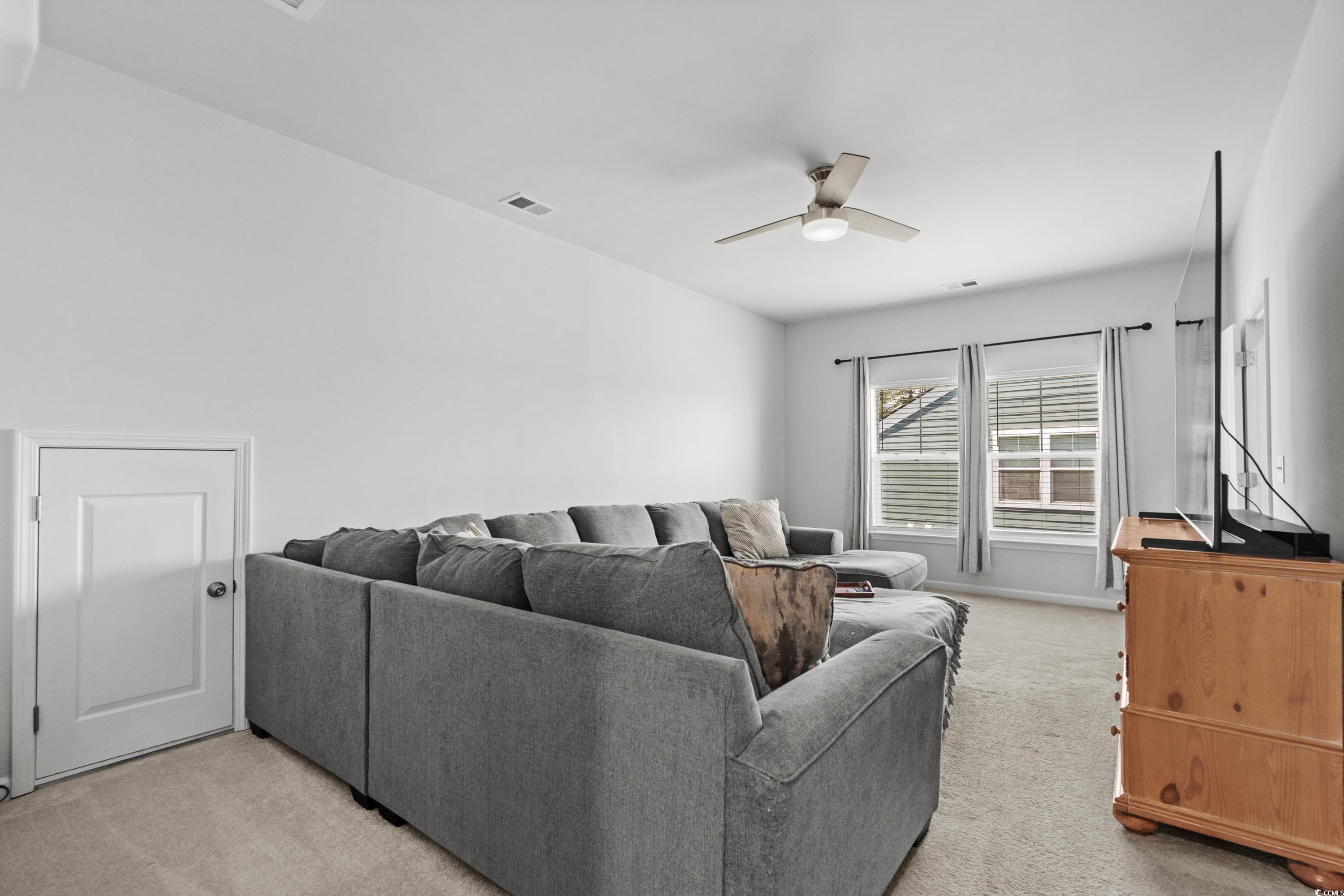 1016 Saluda River Road Murrells Inlet, SC 29576 - Photo 26 of 38 Living area featuring light colored carpet, a ceil