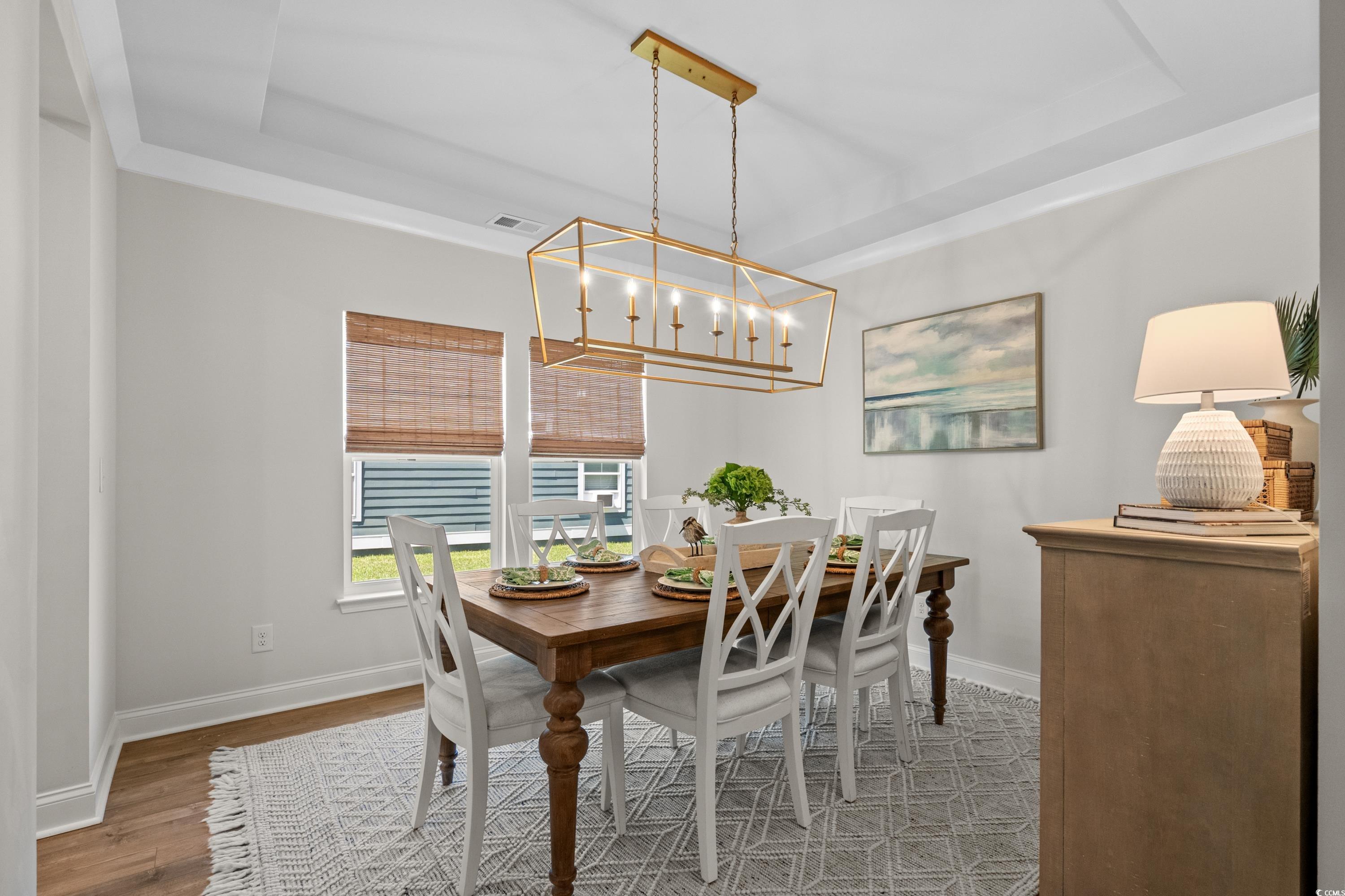 1016 Saluda River Road Murrells Inlet, SC 29576 - Photo 5 of 38 Dining space with a chandelier, visible vents, a t