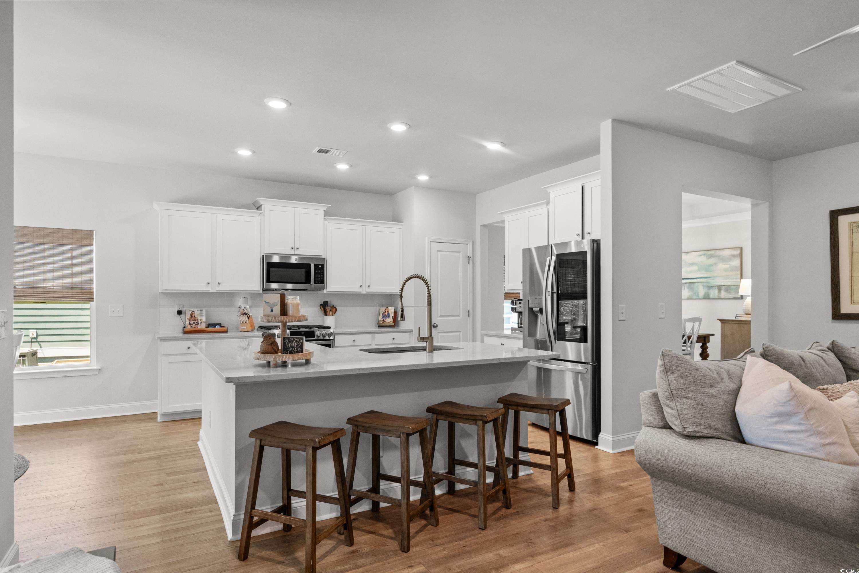 1016 Saluda River Road Murrells Inlet, SC 29576 - Photo 36 of 38 Kitchen featuring a sink, open floor plan, a kitch
