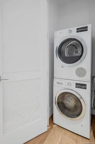 a utility room with dryer and washer