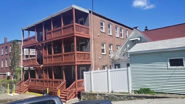a front view of a building with balcony