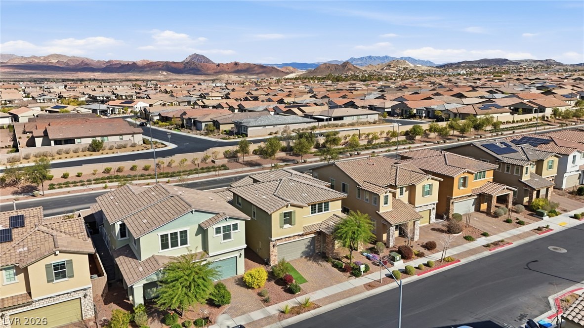 250 Dedication Avenue Henderson, NV 89011 - Photo 61 of 67 Aerial view of residential area with a mountain backdrop