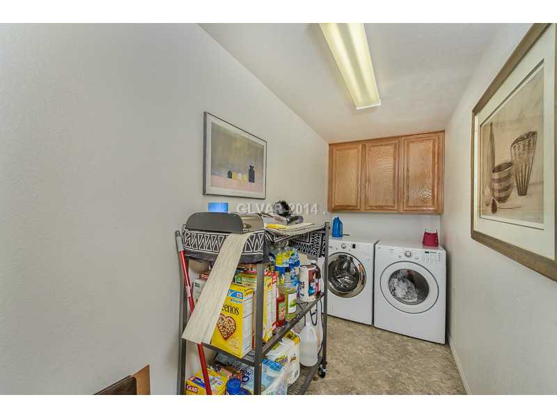 171 Ruby Ridge Avenue Henderson, NV 89002 - Photo 17 of 22 Property Photo. Oversized laundry room w/ cabinets