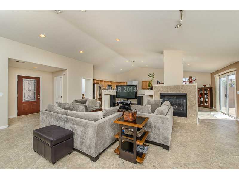 171 Ruby Ridge Avenue Henderson, NV 89002 - Photo 4 of 22 Property Photo. Living room w/ cathedral ceilings