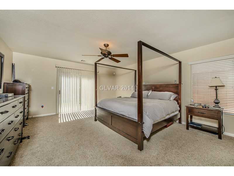 171 Ruby Ridge Avenue Henderson, NV 89002 - Photo 9 of 22 Property Photo. Master bedroom w/ slider to back yard