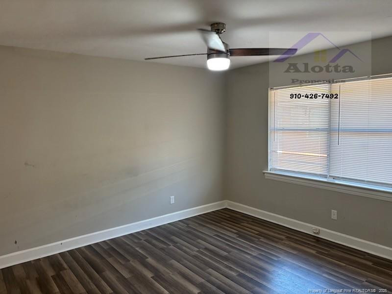 715 South 3rd Street, Unit 6 Smithfield, NC 27577 - Photo 5 of 7 a view of a room with wooden floor and window