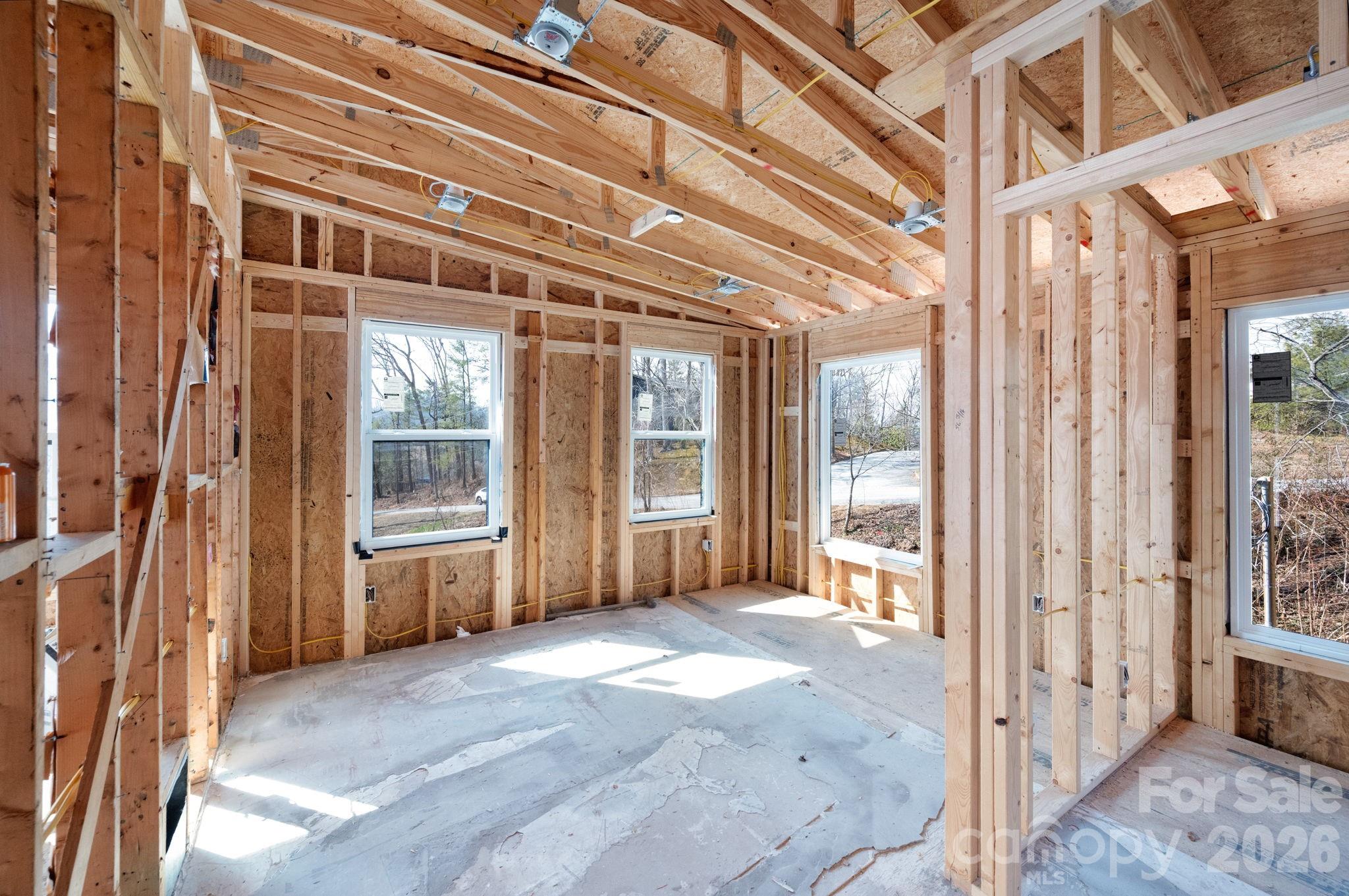 59 Faircrest Road Asheville, NC 28804 - Photo 12 of 24 a view of an empty room with a window